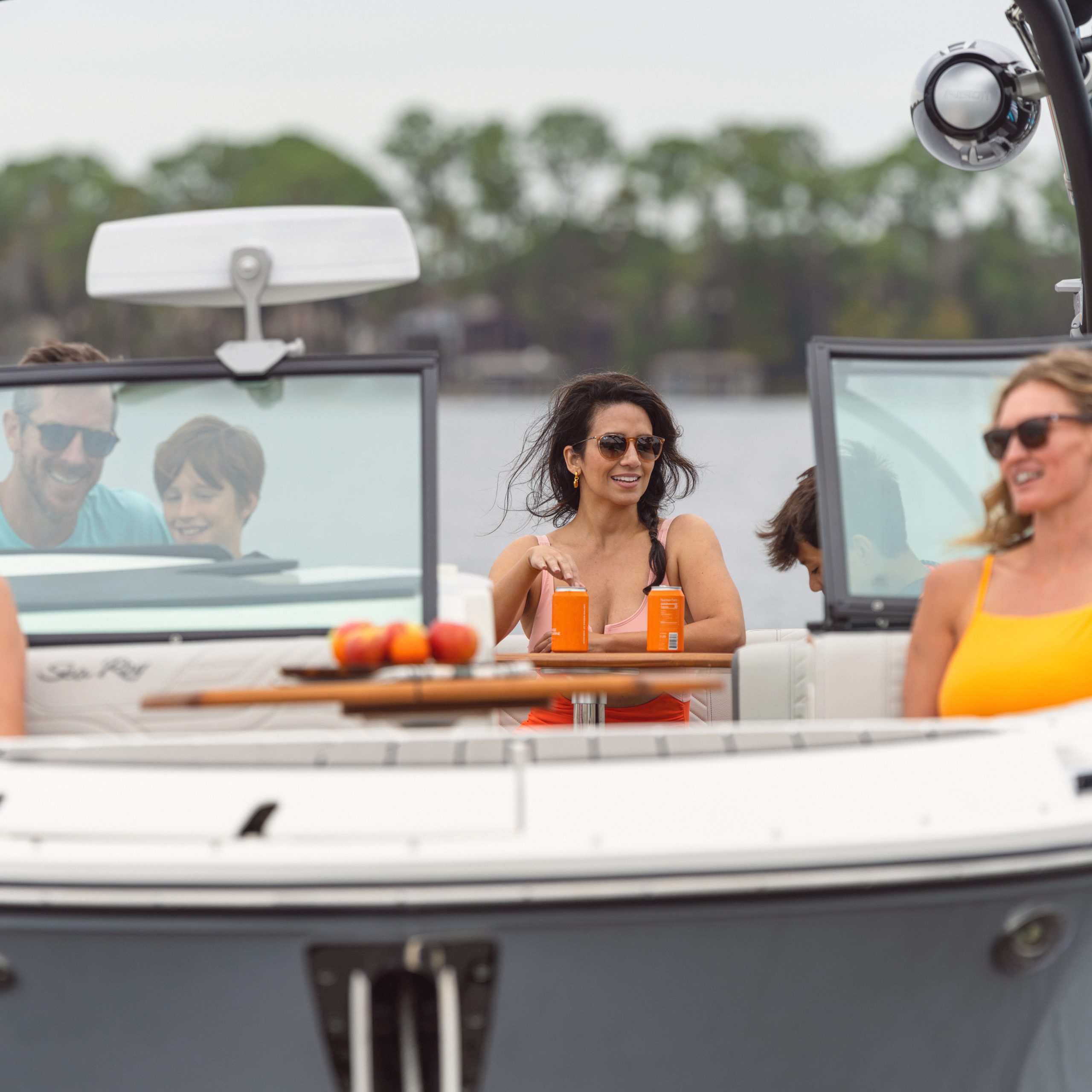 People aboard an SDX 270 Surf